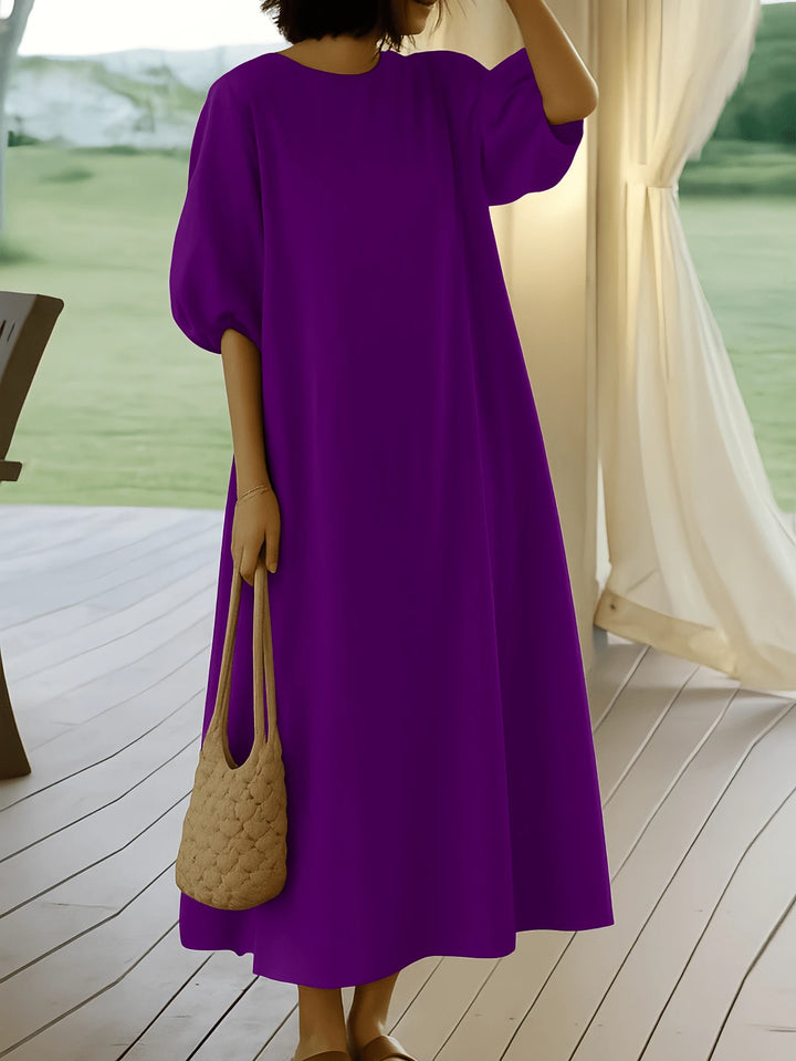 Vestido de dama hasta la mitad de la pantorrilla con mangas abullonadas