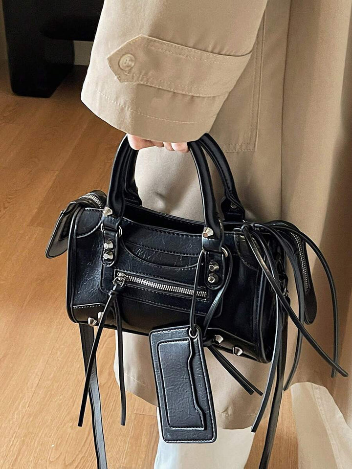 bolsos con tachuelas