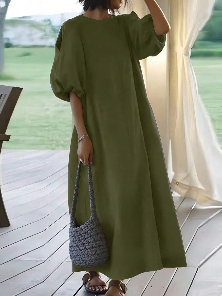 Vestido de dama hasta la mitad de la pantorrilla con mangas abullonadas