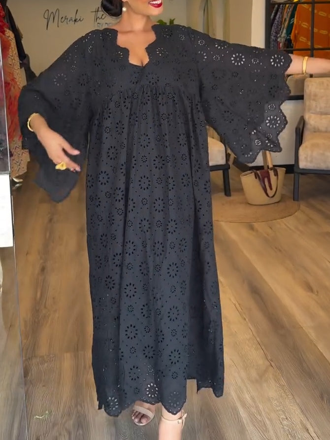 Vestido negro elegante con diseño calado chic