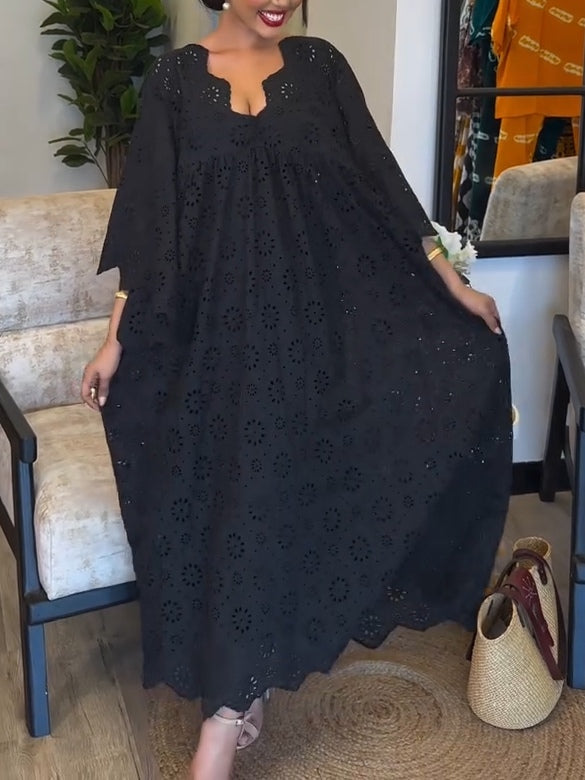 Vestido negro elegante con diseño calado chic
